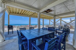 Outdoor dining - Decked Out - Four-Bedroom, Two-Bath Oceanfront Beach House in GCB (Garden City Beach)