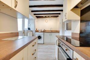 Fridge, microwave, oven, cookware/dishes/utensils