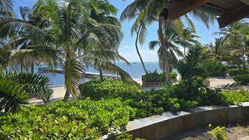 On the beach, sun-loungers, beach towels