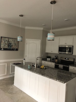 Fridge, microwave, dining tables