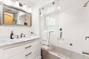 Shower, hair dryer, shampoo
