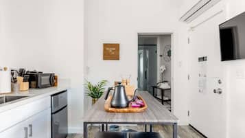 Microwave, coffee/tea maker, cookware/dishes/utensils