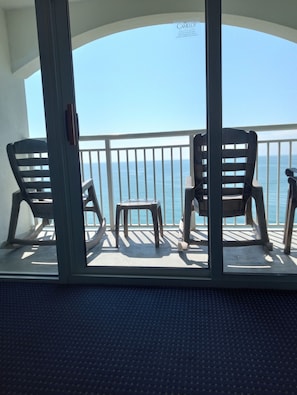 Penthouse View with 2 Rocking Chairs
