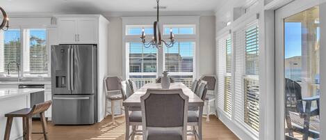 Fridge, dishwasher, coffee/tea maker, cookware/dishes/utensils