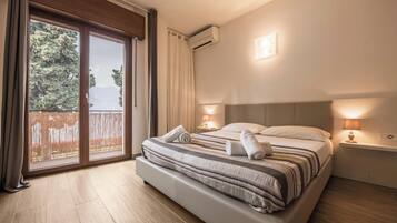 1 Schlafzimmer, BĂŒgeleisen/BĂŒgelbrett, kostenloses WLAN, BettwĂ€sche