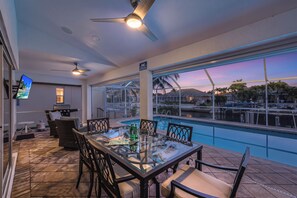 Outdoor dining - Peaceful Waterfront Home | Pool & Steps to Beach (Marco Island)