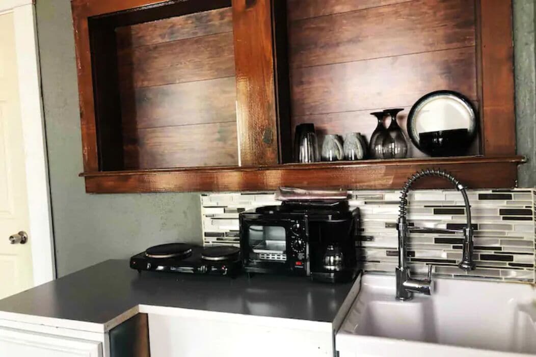 Fridge, stovetop, coffee/tea maker, cookware/dishes/utensils