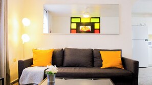 50-inch flat-screen TV with satellite channels, TV