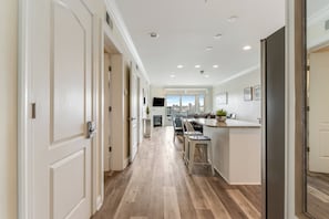 Enjoy cooking in this well-equipped kitchen with a central island and bar stools.
