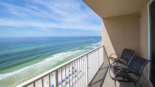 A balcony with a view of the ocean, two chairs, and a railing. - Perfect Location, Perfect View
11th FL - 2 Bd, 2 Ba - Beachfront (Panama City Beach)