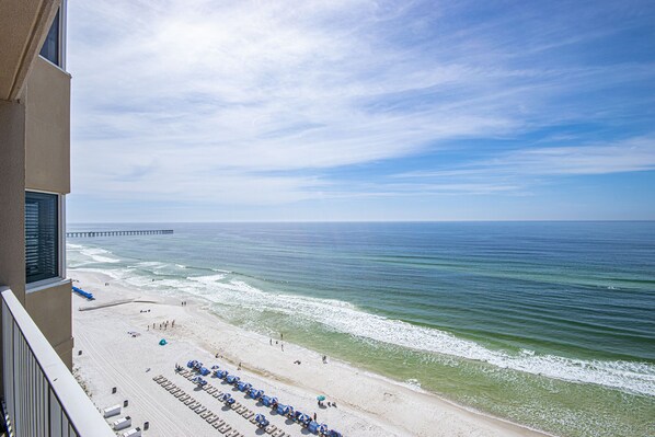 On the beach, sun-loungers