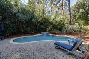 Outdoor pool, a heated pool, pool loungers