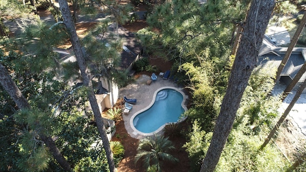 Outdoor pool, a heated pool, sun loungers