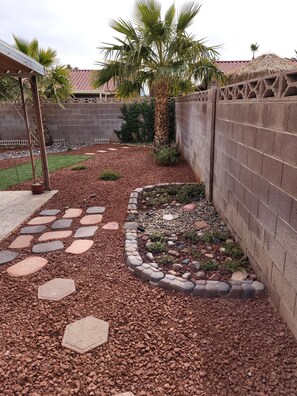 Property grounds -  Relax in this beautiful four-bedroom, three-bath, heated spa/pool Vegas home. (Las Vegas)