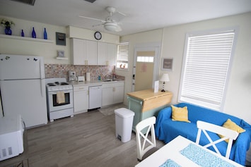 Full kitchen with dishwasher and range 