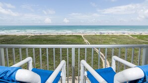A balcony with a view of the beach and ocean. - Beachfront Bliss at Edgewater! Breath-taking Ocean Views, Pool & Hot Tub - Walk to Everything! (South Padre Island)