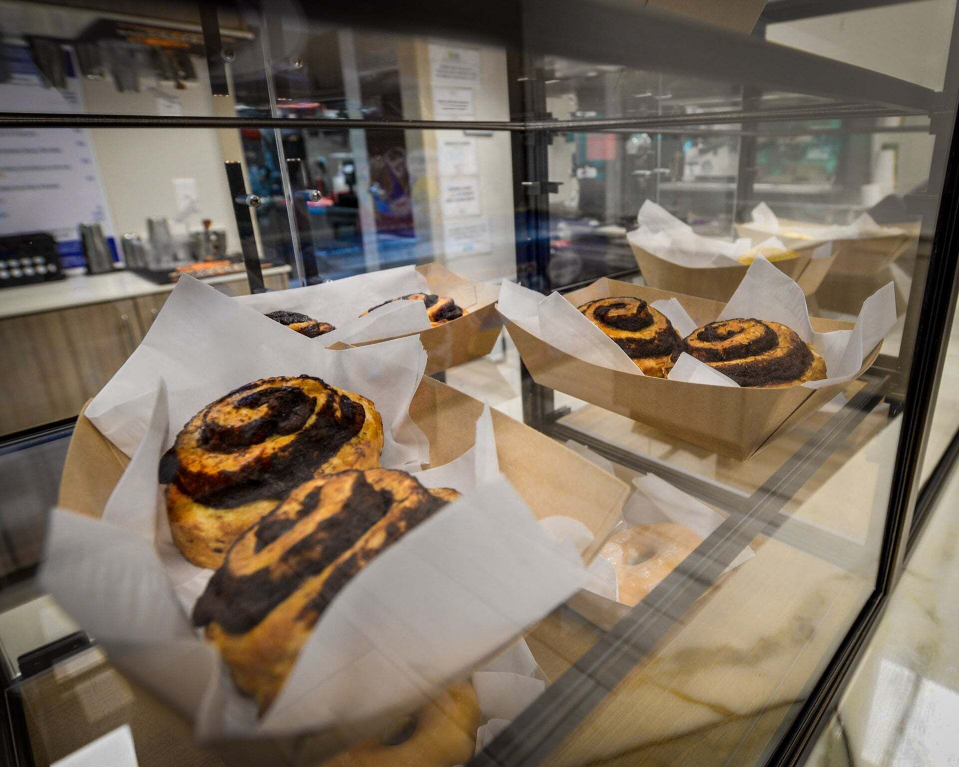 A bakery display case with pastries.