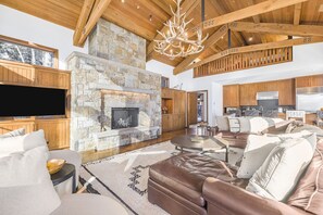 Flat-screen TV, fireplace, video games, DVD player