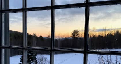 Beautiful home offering privacy on 7 acres with private pond