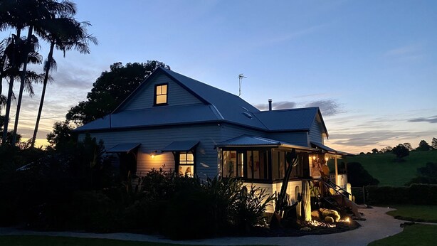 A large house with a prominent roof and a small window. - Benny’s Cottage  Luxury hinterland accomodation & photo shoot location (Clunes)