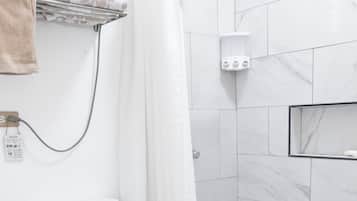 Shower, eco-friendly toiletries, towels, soap
