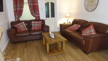 Cottage | Living room | 30-inch TV with digital channels, fireplace