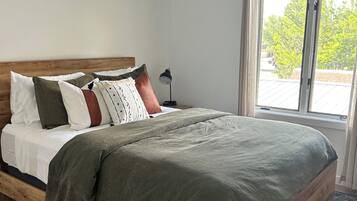 2 chambres, coffres-forts dans les chambres, fer et planche Ă repasser