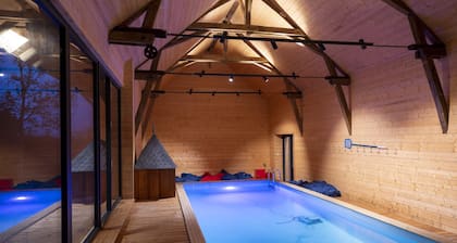 Domaine de Chaillauroy and its indoor swimming pool in the dream barn