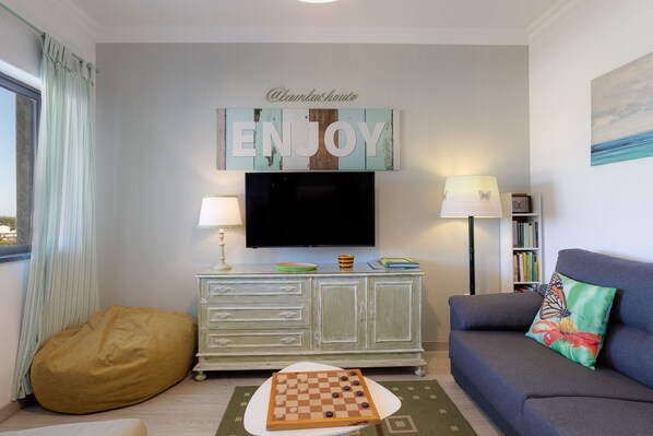Smart TV, foosball, books