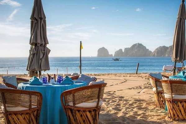 On the beach, sun loungers, beach towels