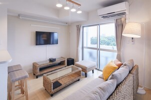 Deluxe Apartment, Non Smoking | Living area | LCD TV