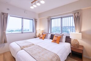 Appartement Deluxe, non-fumeurs | Couette en duvet d'oie, rideaux occultants, chambres insonorisées