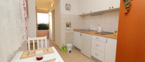 Studio (Standard Studio apartment) | Private kitchenette | Fridge, stovetop, electric kettle, cookware/dishes/utensils