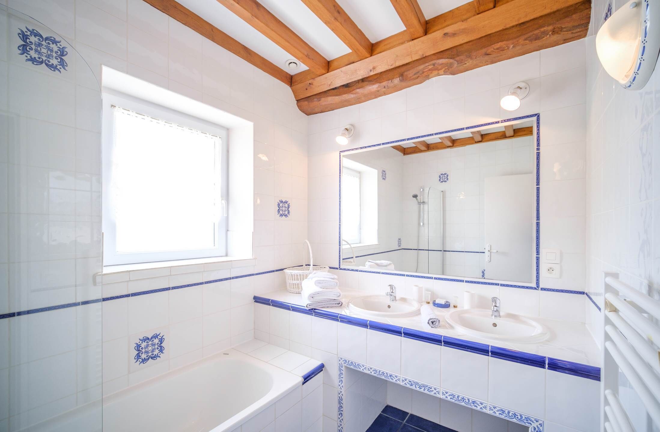 Bathtub, hair dryer, towels