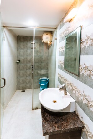 Premium | Bathroom | Shower, free toiletries, soap, shampoo - Hotel Krishna by KeyMagics (Jaipur)