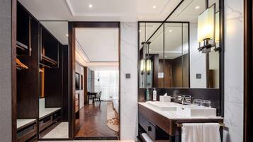 Hair dryer, slippers, towels, shampoo