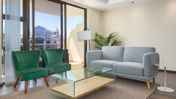 Luxury Apartment | Living area | Flat-screen TV