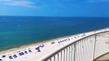 On the beach, sun loungers, beach towels