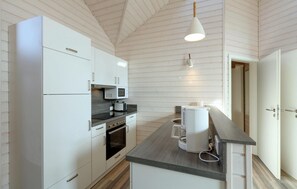 Réfrigérateur, four à micro-ondes, surface de cuisson, lave-vaisselle