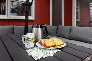 A table with a coffee pot, a mug, and a plate of toast. - 5 STAR BEAUTIFUL HOME: UPPER LEVEL GREAT PRICE, SHORT WALK TO THE BEACH AMAZING! (Wasaga Beach)