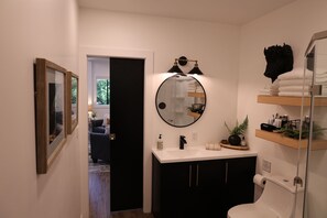 Shower, hair dryer, towels, soap - L3nee's Lay-Up by Creative Cabins (Logan)