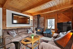 42-inch flat-screen TV with cable channels, TV, fireplace - The Killington Cabin by Killington Vacation Rentals (Killington)