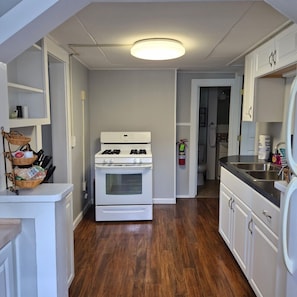 Coffee/tea maker, fridge, microwave, oven