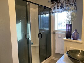 Shower, hair dryer, towels, soap
