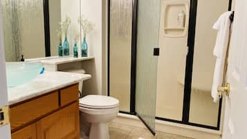Shower, hair dryer, towels, soap