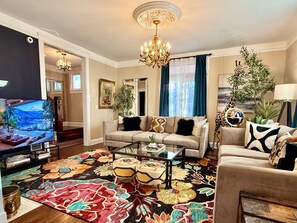 Smart TV, fireplace, books, music library