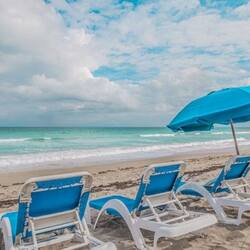 On the beach, sun-loungers, beach towels