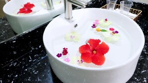 A bathroom with two sinks, each with a mirror above. - Van Giang Hotel (Ninh Binh)