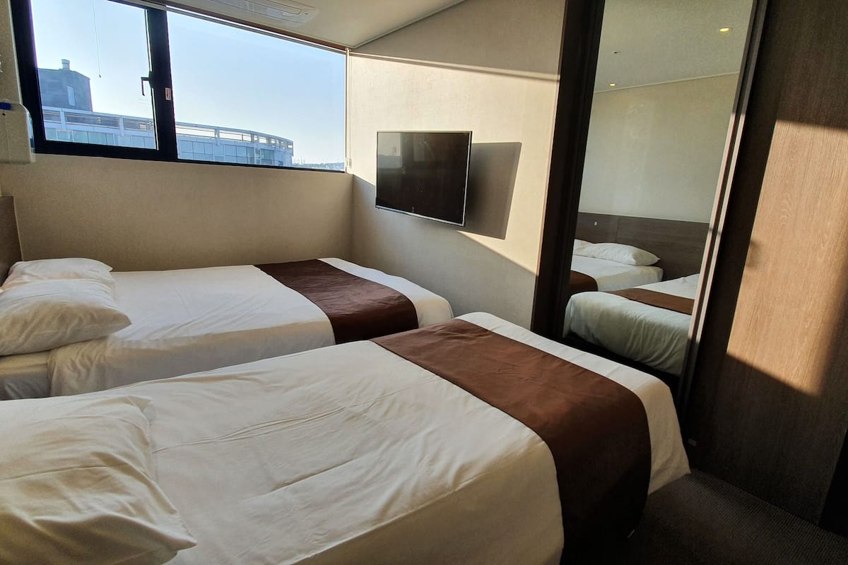 blackout curtains, soundproofing, free wifi, bed sheets