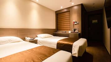 Blackout drapes, soundproofing, free WiFi, bed sheets